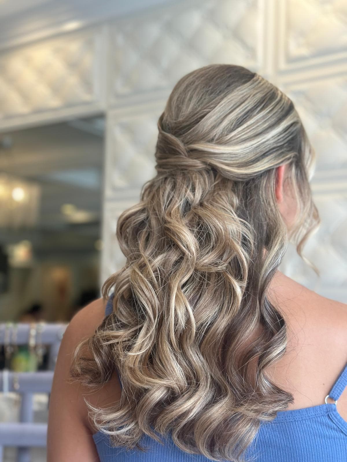 Elegant half-up style with blonde highlights — Crystal Beauty Salon